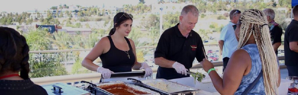 Wedding catering San Diego setup with slow-smoked Texas BBQ, sides, and full-service event presentation by Abbey’s Real Texas BBQ