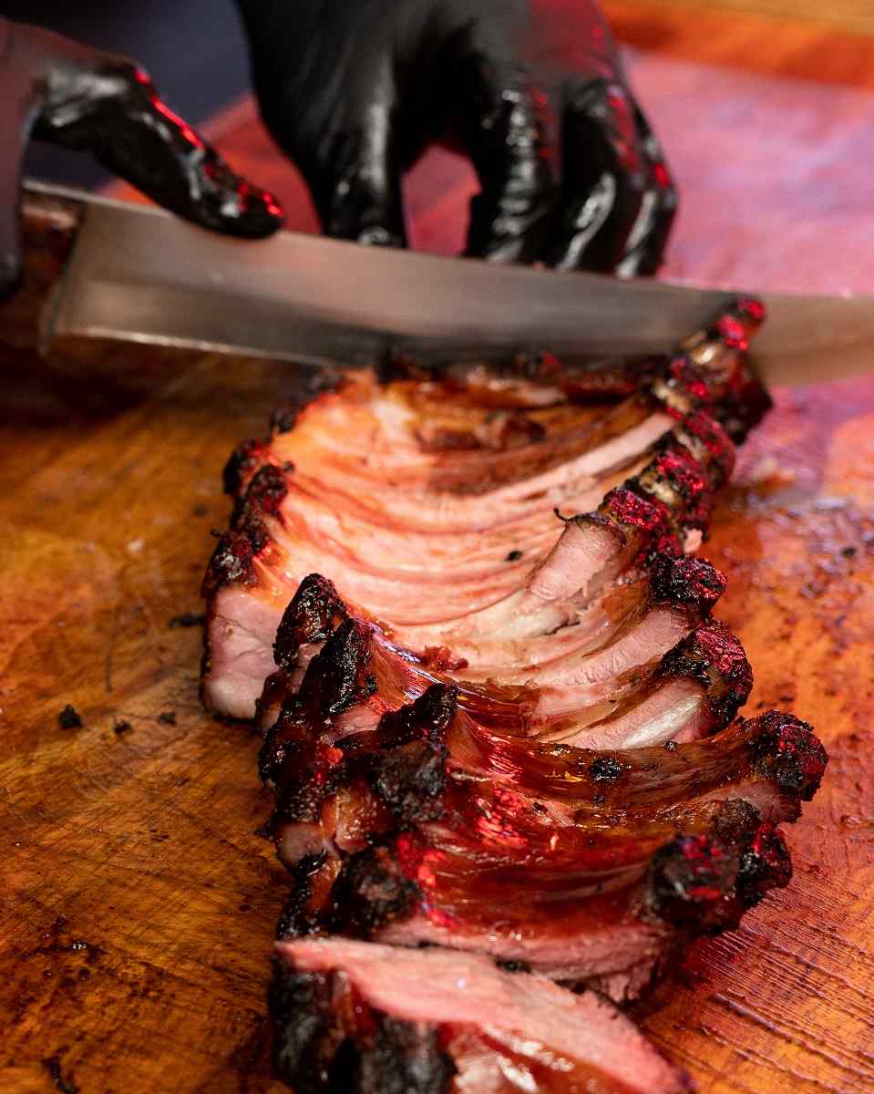 Tender baby back ribs served fresh at Abbey’s Texas BBQ San Diego